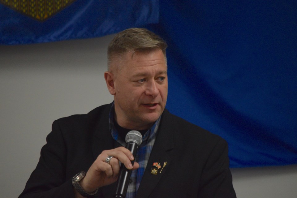 Lac Ste. Anne - Parkland MLA Shane Getson answers a question from moderator Bill Lee about Bill 29.
