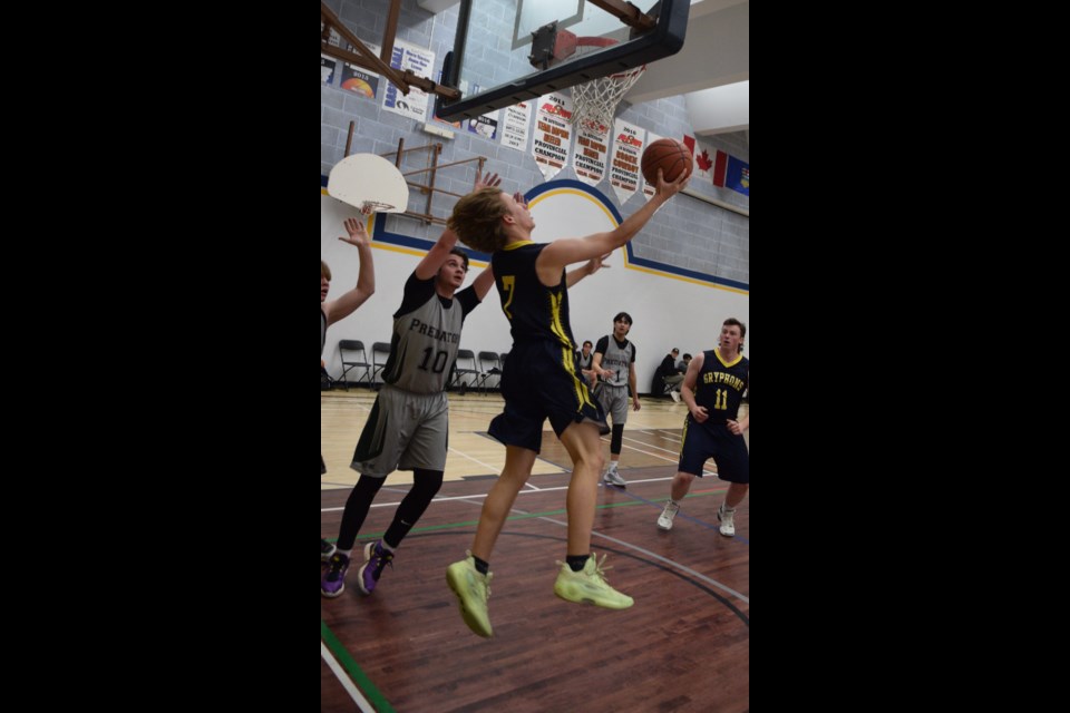 Barrhead Gryphon Simon D' haene with an under the basket layup attempt in the second quarter of a Jan. 24 game against Athabasca at home.