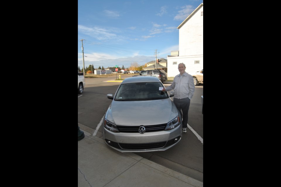 Former County of Barrhead reeve Joe Smith, pictured here after he successfully passed his driver's licence in 2014, passed away on July 11.

