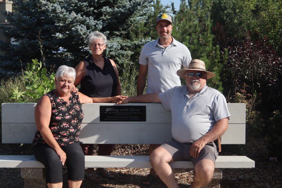 A bench bearing the name of Ciera Falkenberg was donated to R.F. Staples on August 7. Ciera was an EA at R.F. Staples who passed away in a car accident on April 7. From L-R: Shelly Falkenberg (Ciera's mother), R.F. Staples Educational Assistant Sue Starr, R.F. Staples Associate Principal Derek Dachyshyn and Dave Falkenberg (Ciera's father).