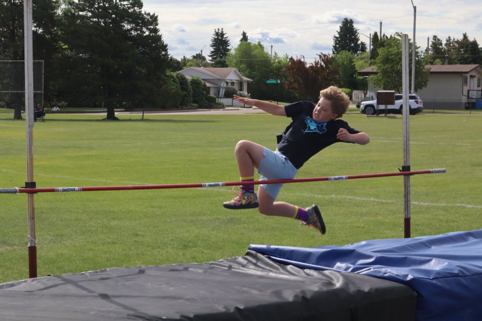 Parker Visser flies high in the Ecole Westlock Elementary school track and field day on June 6.