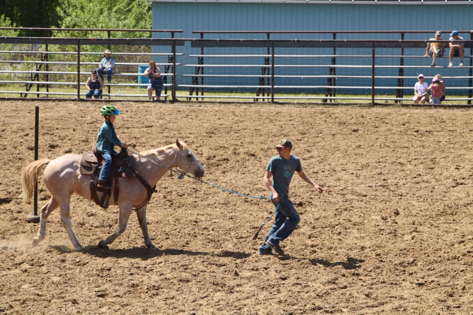 A younger rider tests his skills at the Long Island Lake Gymkhana summer series.