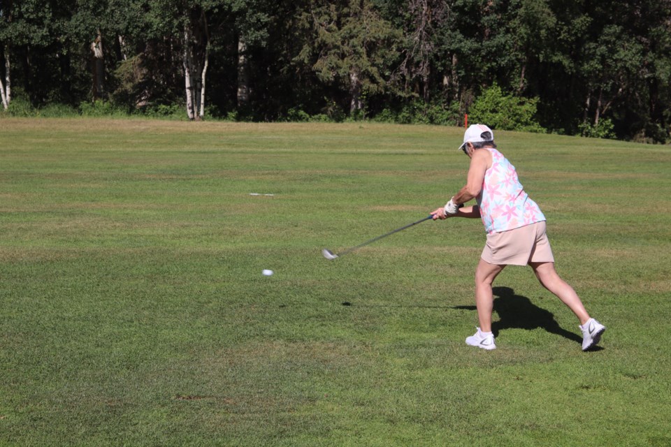 Mary Olito tees off at the Westlock Legion Golf Tournament on July 12.