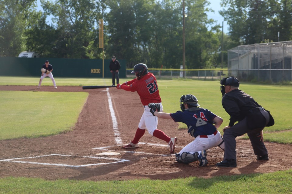 The Red Lions Nathan Brown scores a hit against the St. Albert Cardinals on June 19.