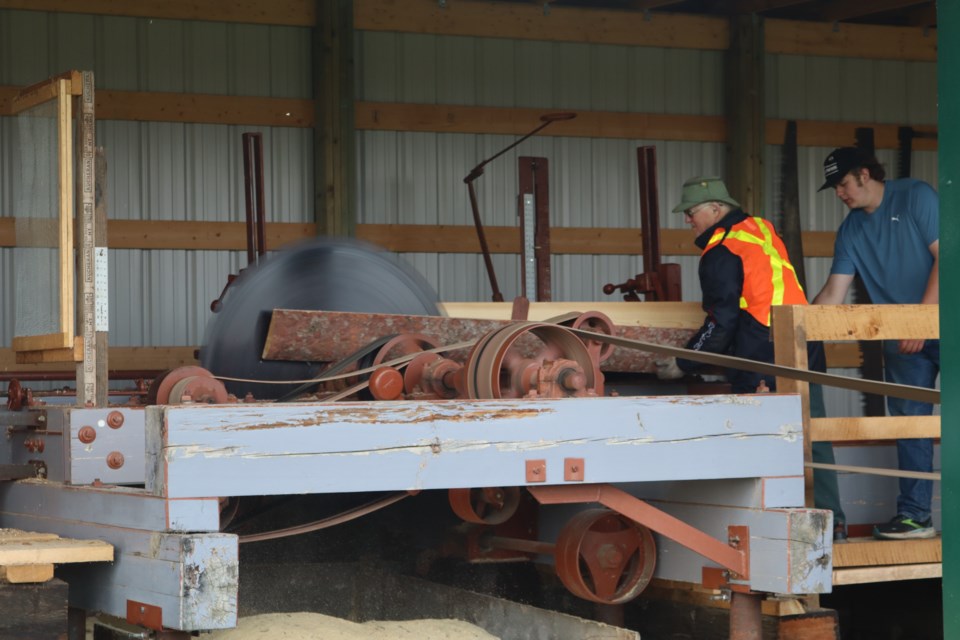 The tractor-powered sawmill at the  Westlock vintage tractor show.
