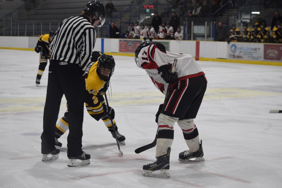 Barrhead's Tayson Hallock lines up for an offensive zone faceoff in the second period of a playoff game against the Mayerthorpe Mustangs on March 4.