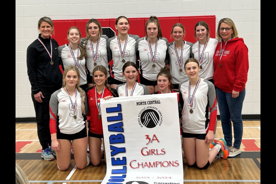 The R.F. Staples senior girls volleyball team gathers together for a team picture at the conclusion of the 3A North Central Zone Championship on Nov. 18. The two-day tournament was hosted at R.F. Staples School and drew a total of eight teams, with the T-Birds emerging as the eventual victor.