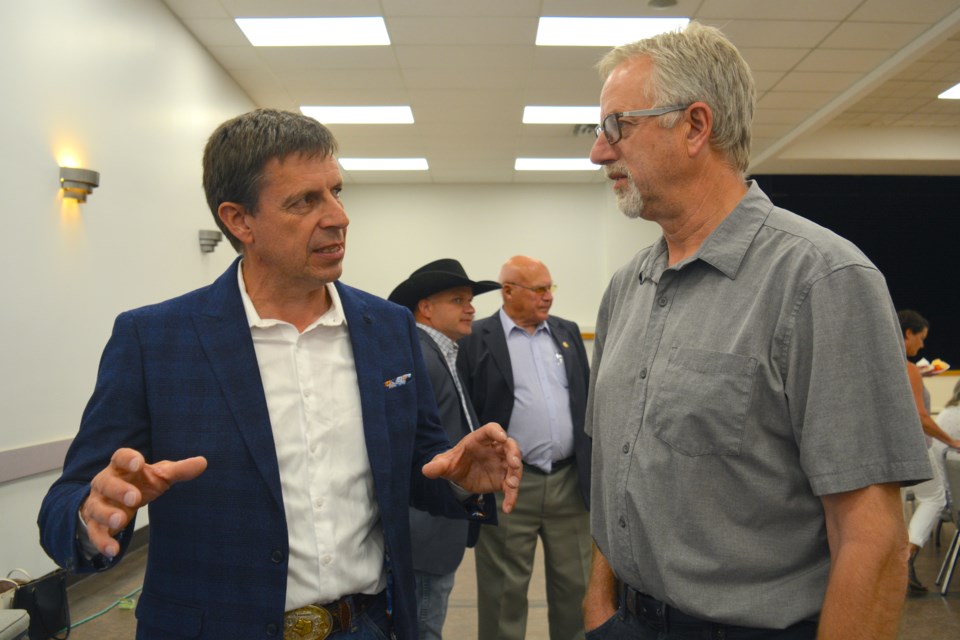 Leadership candidate Todd Loewen promised trust, transparency and accountability during the forum and chatted with an attendee afterwards. 