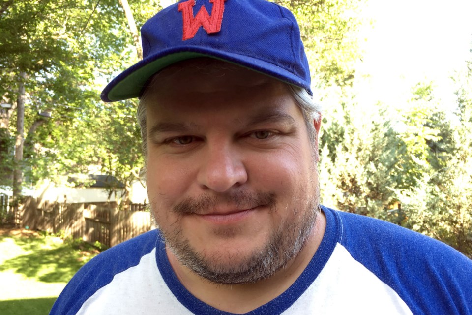 Steven Sandor, sporting a vintage Westlock Legionnaires hat, says his latest book Easy Out uses Westlock as its setting. 