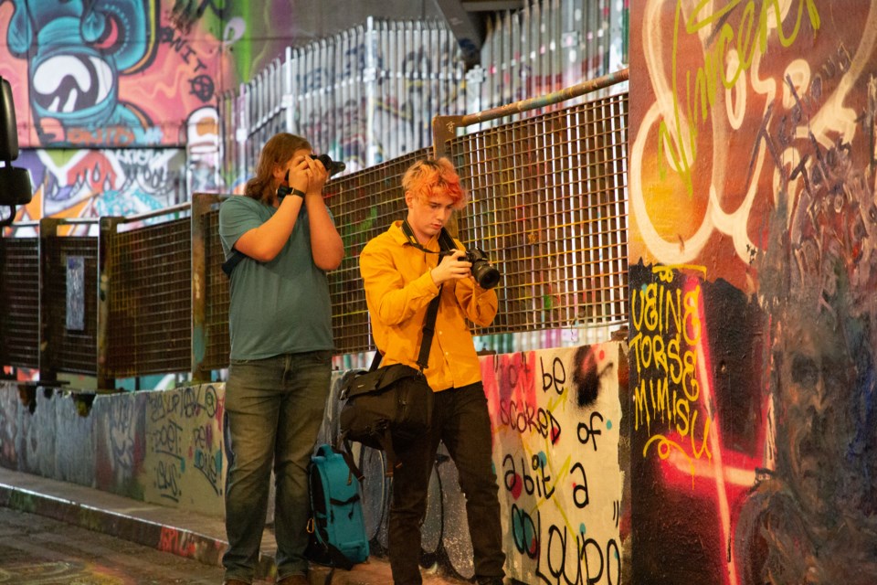 BCHS portrait photography students Matt Foster-Rose and Mitch McGarva at the Leake Street graffiti tunnel near the London Eye.