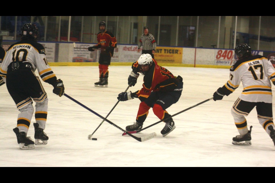 Westlock U18 Warriors' player Jackson Rufiange moves down the ice on his way to score Westlock’s fifth goal against Barrhead in their playoff match on March 3 at the Rotary Spirit Centre. The Warriors won 7-2.