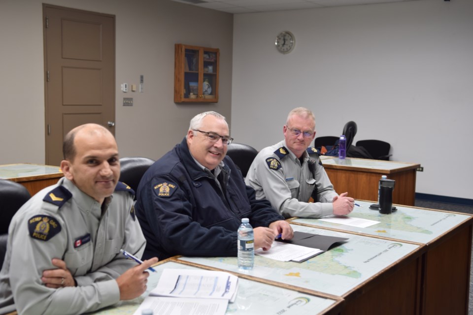 The Barrhead RCMP hosted a virtual town hall on Nov. 22 from the County of Barrhead council chambers. Pictured from left: Barrhed RCMP Cpl. Filipe Vicente, Barrhead RCMP Sgt. Bob Dodds and Westlock Traffic Unit Sgt. Lee Drinkwater.