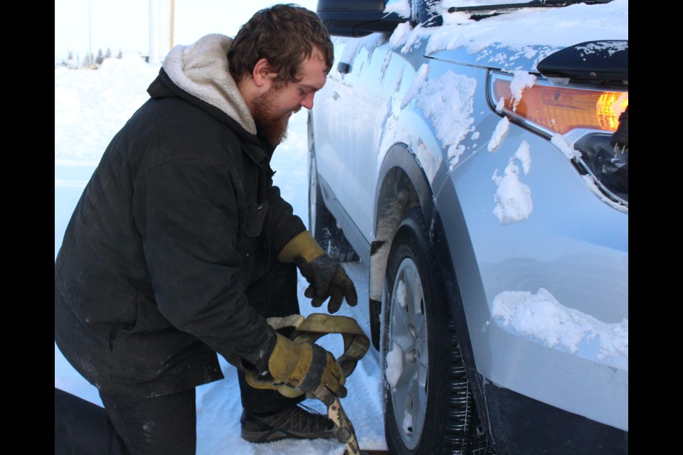 Despite temperatures dropping to -35 C  Dec. 30, Marcus Payne with County Towing in Westlock still has a job to do towing vehicles. Throughout the Christmas holidays, temperatures in the region fell to near record lows, reaching -41.8 C Dec. 27.