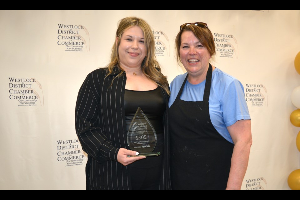 Kayla Killeen, of Sobeys, left, and sponsor Jackie Comeau of Isabel’s Catering accept the business of the year (30-plus employees) award on behalf of Sobeys during the inaugural Westlock and District Chamber of Commerce Business Awards Gala at the Westlock and District Community Hall April 23. 