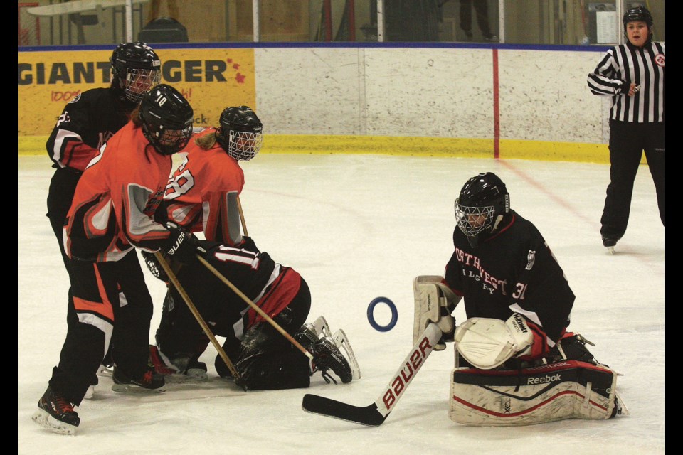 Pembina Rage’s Kianna Stadnyk (left) and Brooke Fels looked to score during the club’s Saturday-morning matchup at the 2022 U16B Provincial Ringette Championships at the Rotary Spirit Centre versus the Northwest Velocity. The girls dropped the game 7-2 and ended up finishing eighth at the 12-team tournament with a 1-3 record.