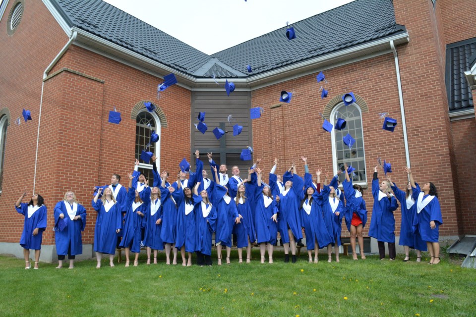 Graduating students at St. Mary School kicked off day-long graduation celebrations with a mass and traditional cap toss outside St. Mary of the Assumption Church on May 27. The morning events were followed by a dinner and diploma presentation at the Westlock Community Hall later that evening.  
