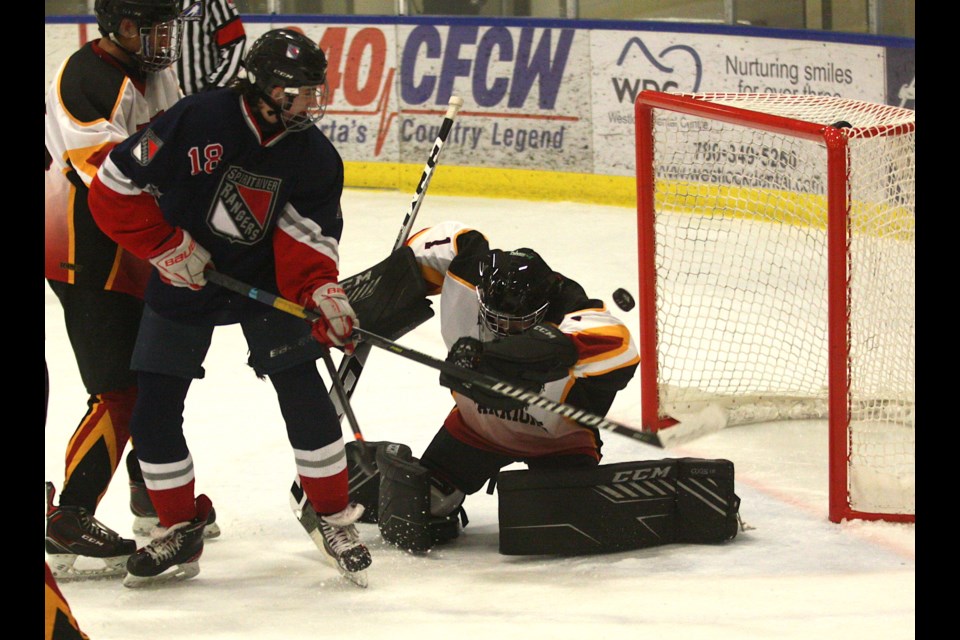 Westlock played hosted to U18 Tier 2 Provincial Championships March 31 to April 3 at the Rotary Spirit Centre. The Westlock Warriors went 1-1-1 during the round robin and missed out on the playoffs. Warriors’ goalie Jackson Berube made this save during the club’s second game of the tournament April 1, a 2-2 draw versus the Spirit River Rangers. 