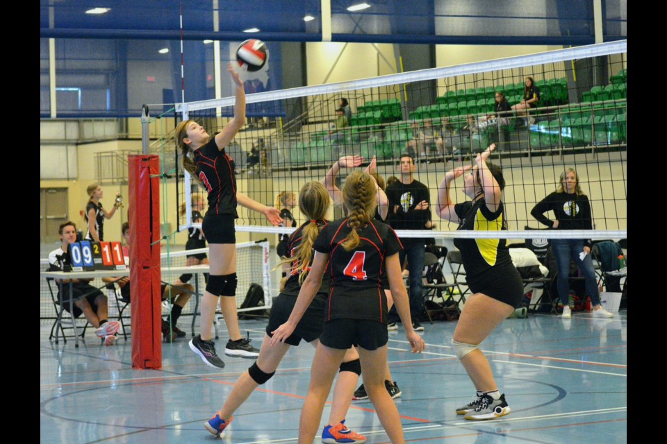 R.F. Staples School’s junior high girls volleyball team earned a silver medal atthe Pembina Hills Public School (PHPS) Division 1 Volleyball Championship Nov. 15 at the Rotary Spirit Centre. ABOVE: Quinn Hittinger looks to make a kill at the net. 