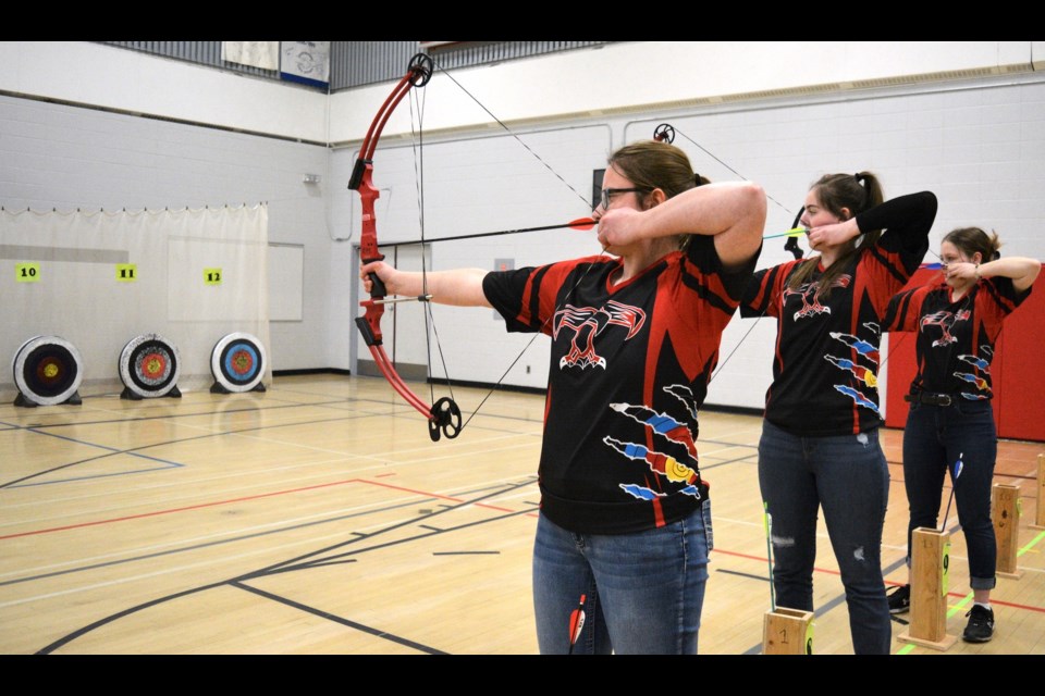 The R.F. Staples Thunderbirds Archery Club hosted the third-annual R.F. Staples Thunderbirds Open Feb. 17 and welcomed 171 archers from eight schools around the region, including 38 junior and senior high students in Grades 7 to 12 from the T-Birds archery club. Pictured are senior high shooters, L-R, Sara Barabas, Marina Quist and Heleena Neuman.
