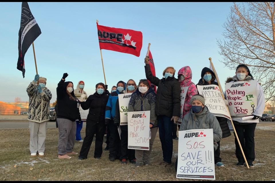 Alberta Union of Provincial Employees front-line health care workers across the province walked off the job Oct. 26, staging pickets like this one on 104 Ave in Westlock — similar scenes played out in Barrhead and Athabasca.
George Blais/WN