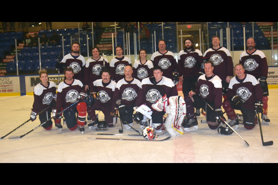 The champions from last year's Home Time Hockey tournament. back row, L-R: Kolbe Waldner, Kyle Laughy, Jake Murphy, Skye Byrt (Cloutier), Brad Melnyk, Chris Dubrule, Lucas Allen and Richard Fairholm. Front row, L-R: Larissa Filewich (Hardie), Cody Miller, Zach Schram, Troy Madson, Colin Decker, Rod Kaliel (C) and Wayne Rufiange.