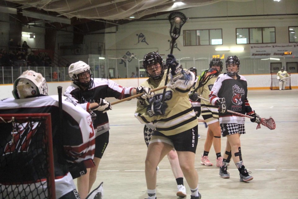 Westlock's Madison Howse, playing for the St. Albert Drillers, prepares to throw the ball at the net in a game against the Red Deer Riot earlier this season. The club will be hosting the 2023 Alberta Major Female Provincial Lacrosse Championships July 7-9 at the Rotary Spirit Centre.