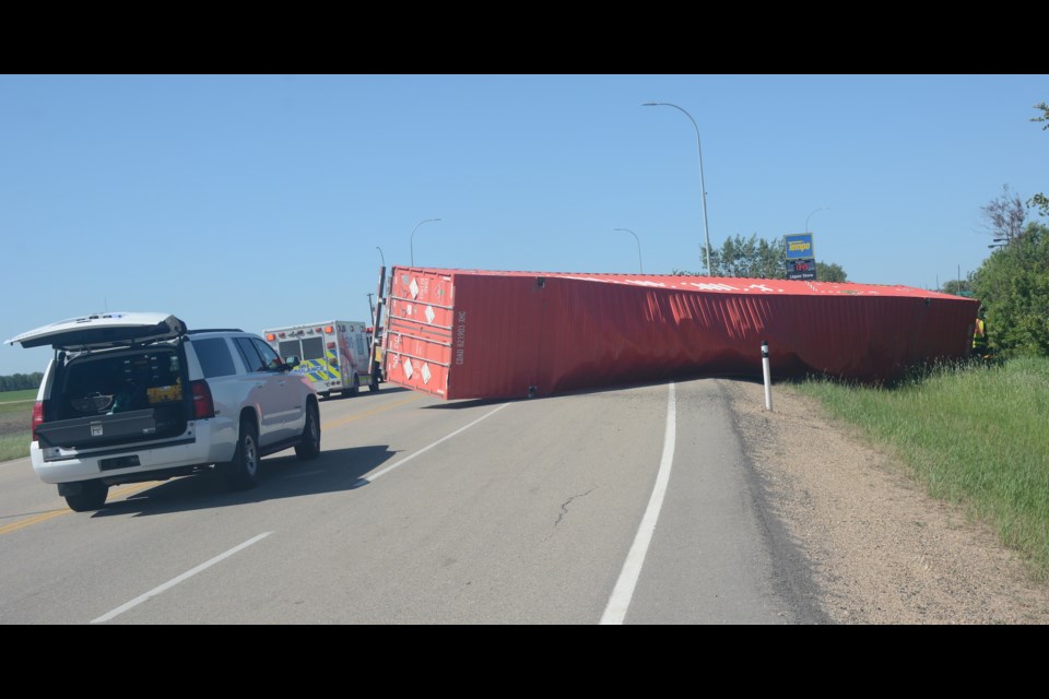 A 35-year-old Calgary man is dead following a June 6 collision on Highway 44, roughly 23 kilometres north of the Town of Westlock. Westlock RCMP say a black Ford F-150 heading west on Highway 661 crossed Highway 44 and was clipped in the front by a southbound semi. The collision caused the semi to roll and trapped the driver inside. The highway finally reopened to traffic around 8 p.m., June 6.
Photos by Les Dunford/WN