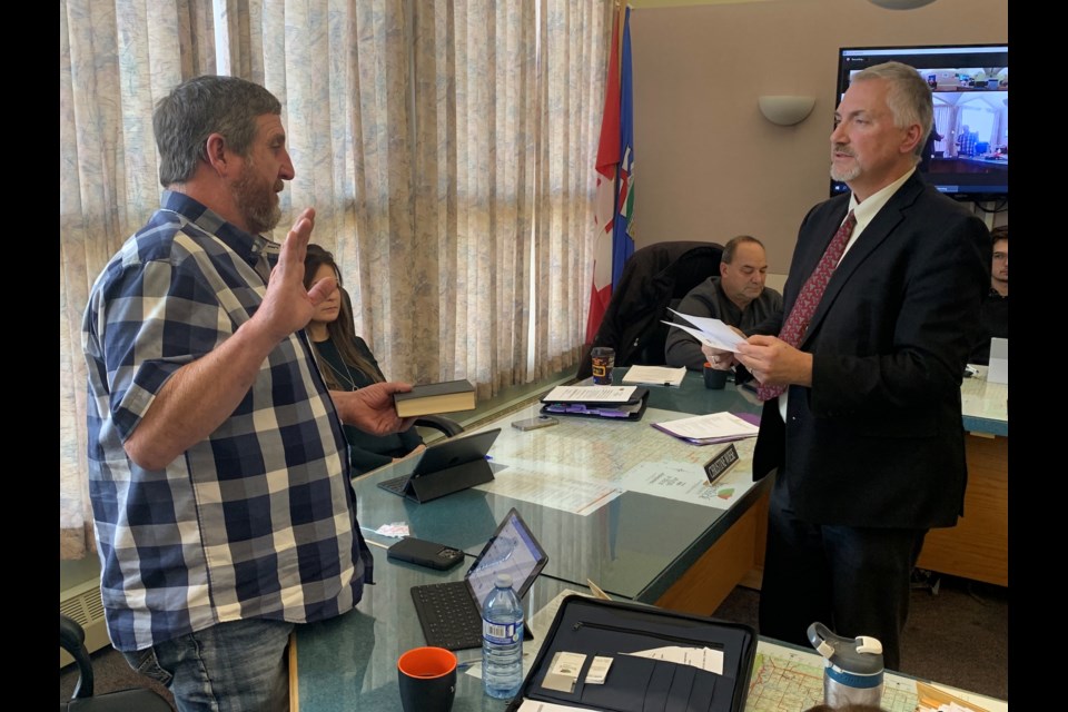 Coun. Ray Marquette gets sworn in as deputy reeve by Kulbisky.