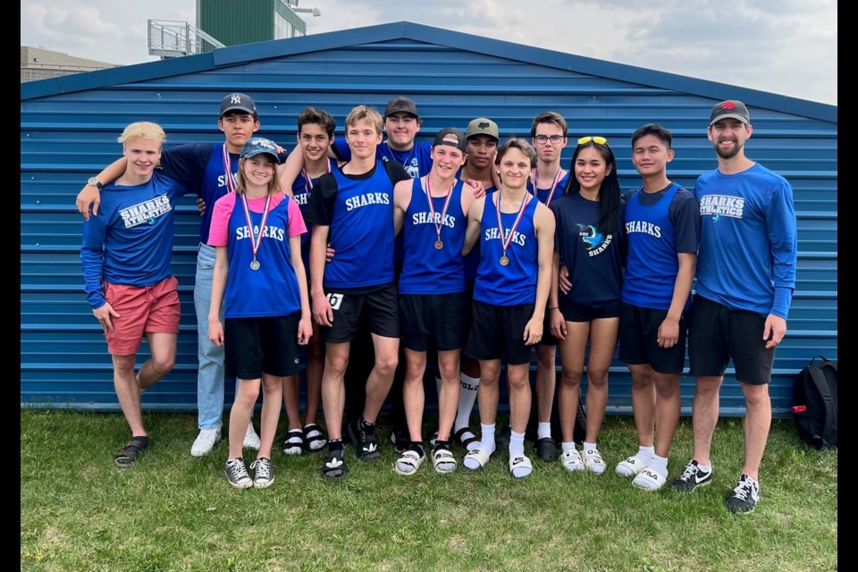 The St. Mary School track and field team at the May 26 North Central Zone meet held at Foote Field in Edmonton. Back row, L-R: Jacob Demers, Thamir Kiss, Riley Chattargoon, Brad Wade, Josh Booth and Hayden Bennett. Front row, L-R: Brelayna Muller, Reint Boelman, Jackson Churchill, Jaxon Magus, Angel Lizano, Abraham Quilonio and coach Ty Snell.