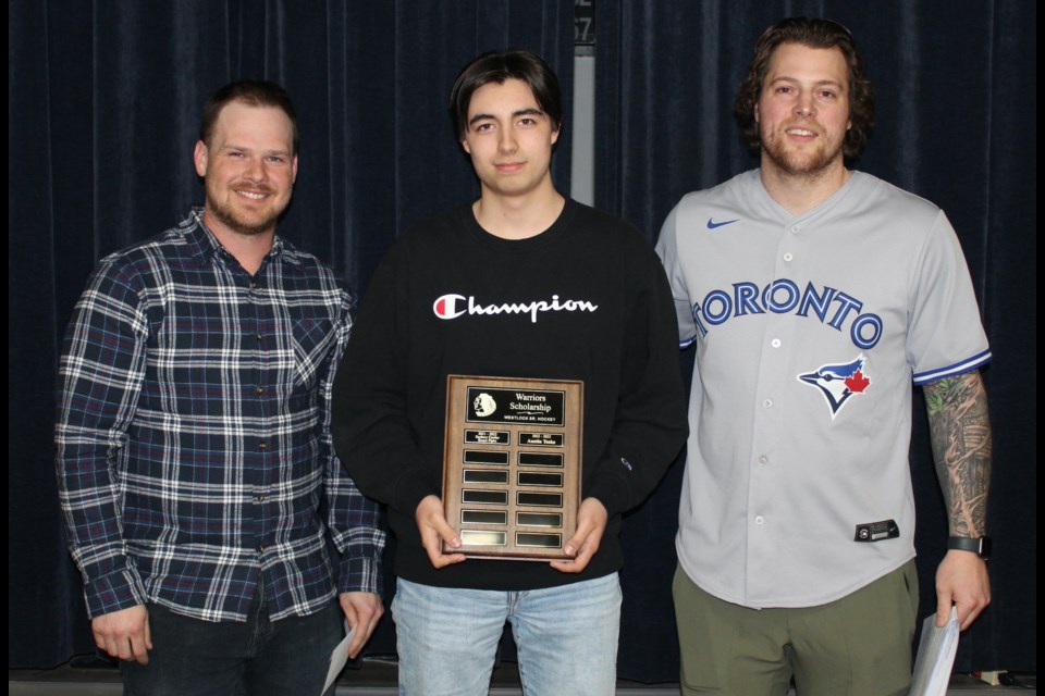 At the second-annual Senior Warriors Award Night held April 15 at the Legion, Austin Teske (centre) received the $1,000 Warriors Scholarship from Senior Warriors Nathan Brown (left) and Mike Ivey