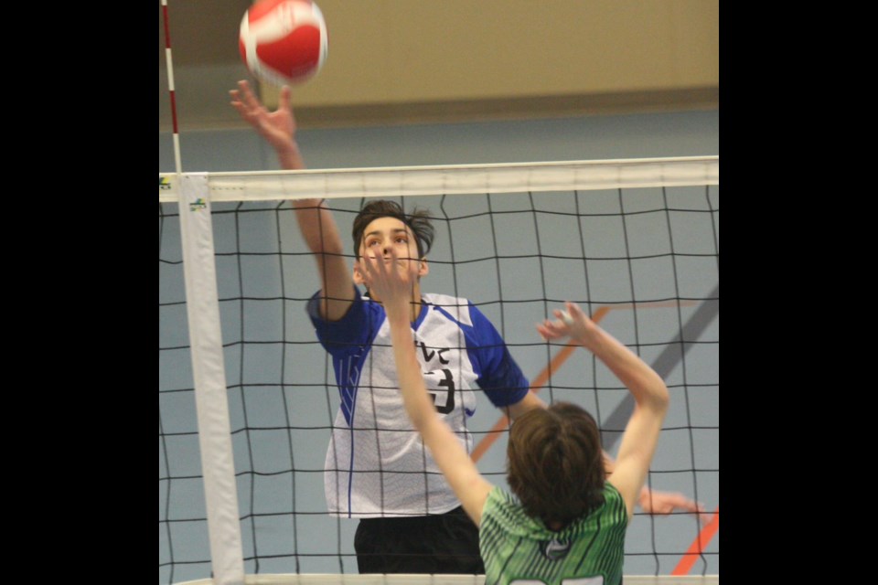 WVC’s Riley Chattargoon tips a ball over the net during the club’s open match at their home tournament played Feb. 11 at the Rotary Spirit Centre (RSC).