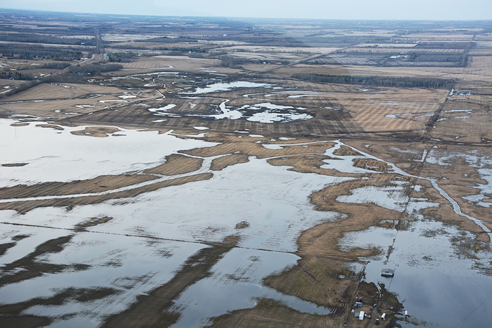 The flatland area looking northwest towards Dapp that same day shows a lot of water from spring runoff spilling over the banks of Irish Creek. A week earlier, it was almost a complete sheet of water covering the area. Les Dunford/Town & Country