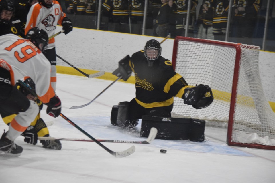 Steelers goaltender William Bain prepares to make a save in the third period. Bain would stop 37 out of 41 shots for the win. He was especially busy late in the third period in the game's final two minutes when Barrhead was killing a late penalty.
