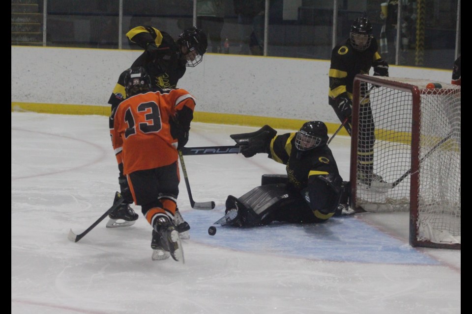 Barrhead goaltender William Bain stretches out to make a save in the first 10 minutes of the third period.