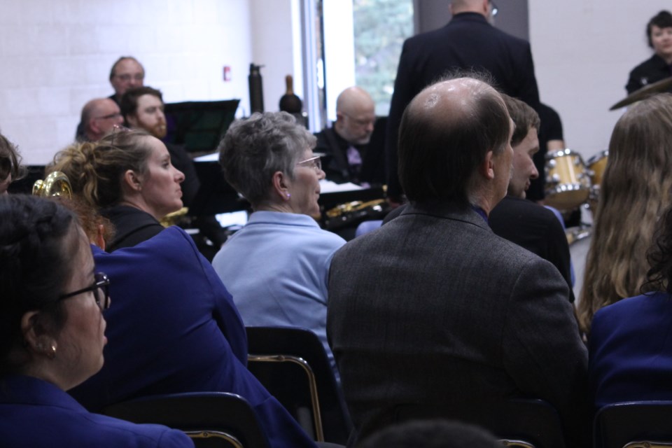 Audience members enjoy the beautiful melodies from the Thorhild band. 