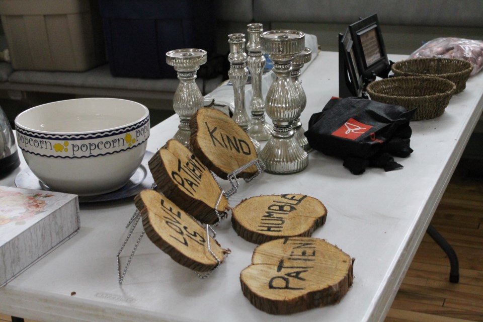 A custom set of signs encouraging love, patience and kindness.