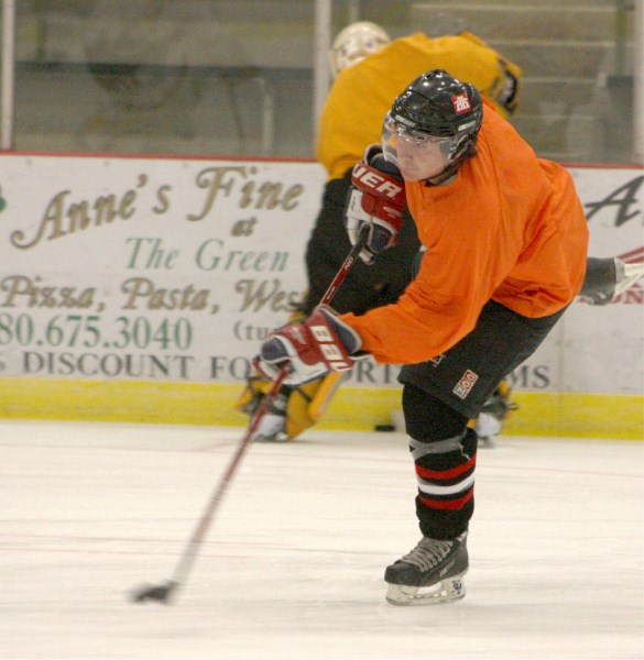 Athabasca Ace Jody Tangedal rips the puck on net during tryouts in late September.