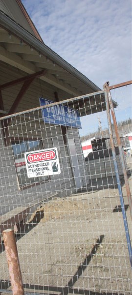 The east end of the Athabasca train station, sealed off just prior to underpinning of the foundations.