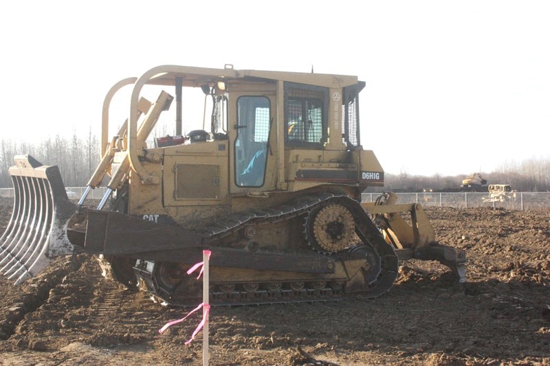One of the heavy equipment operator pilot project students works a bulldozer on a test site northwest of Boyle as part of the practical portion of the 12-week program.