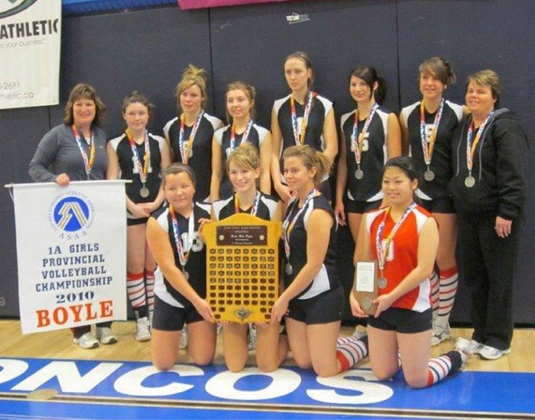 The Boyle senior Husky girls pose with their silver medlas and plaque after finishing second at 1A volleyball provincials on Nov. 26-27 held in Bassano.