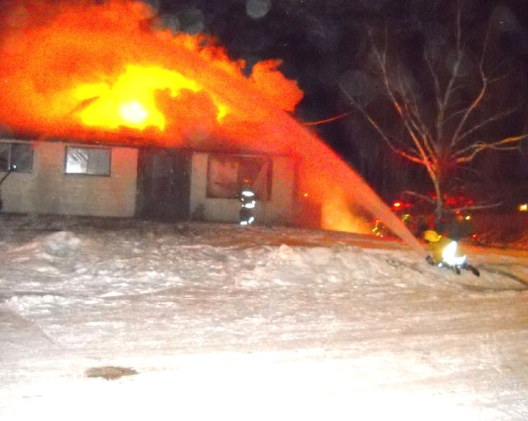 Boyle Fire Department crews battle a house fire that broke out shortly after 1 a.m. on Dec. 12. Boyle village councillor Sam Assaf awoke the family that was sleeping inside