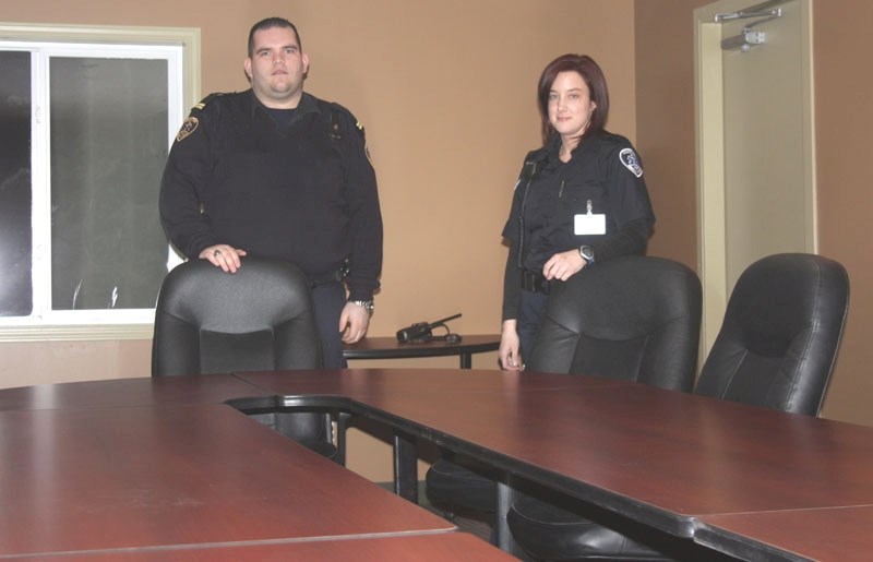 Doug Topolnitsky (l) and Corliss Hardie stand in Associated Ambulance&#8217;s boardroom in their new facility at the corner of Hwy 663 and 831 in Boyle on Jan 19.