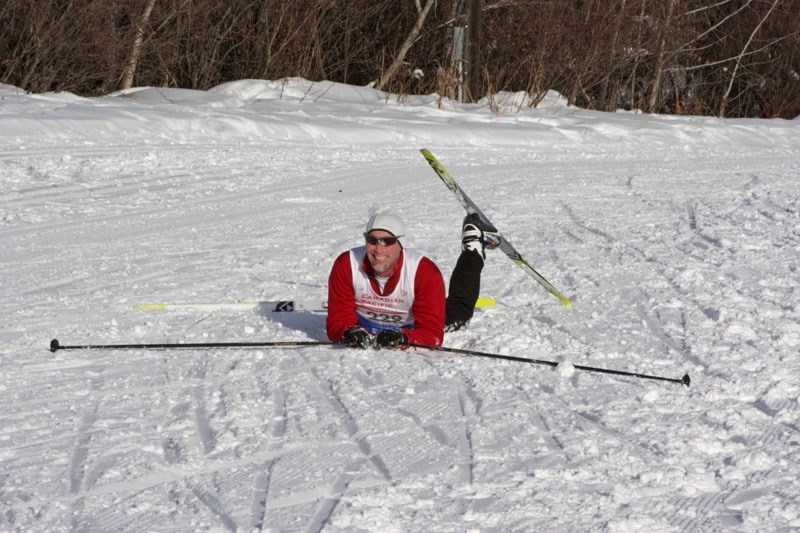 Jonathan Alexandruk of Edmonton takes a fall on the Muskeg Creek Trail during the 2011 Athabasca Loppet on Sunday.