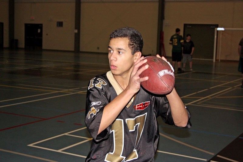 EPC Pacers quarterback Gaetano Minto runs a pass drill during football camp at the Multiplex last Tuesday.
