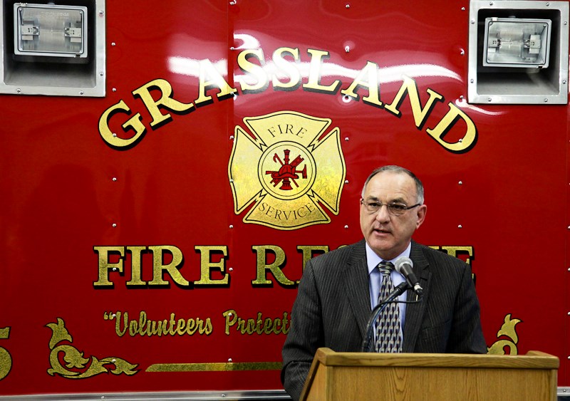 Hector Goudreau, Minister of Municipal Affairs, unveils the provinces plans to step up emergency response on Highway 63 last Monday.