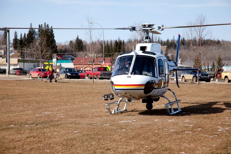 Edmonton RCMP officer Kathy Stewart landed a helicopter on the Athabasca Town Common Monday morning.