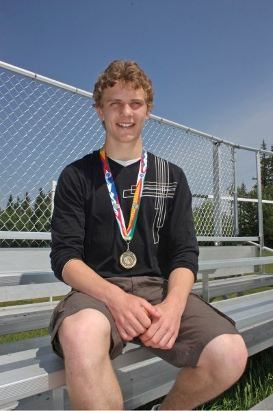 Neil Topola earned a gold medal in the long jump at his very first provincial track and field competition this month.