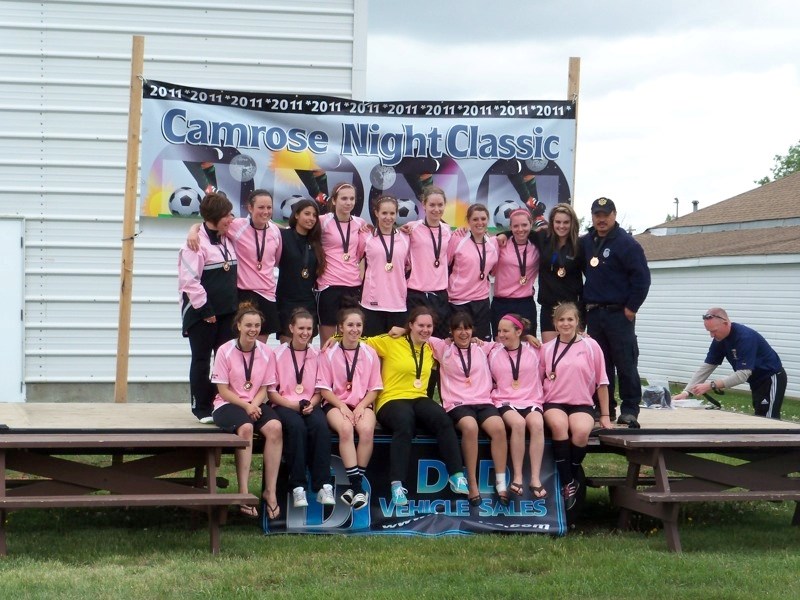 The Athabasca U18 Pink Panthers girls soccer team won bronze at the Camrose Night Classic on the weekend of June 10. (back row, l-r) Manager Stacey Gustafson, Amy Zacharuk,