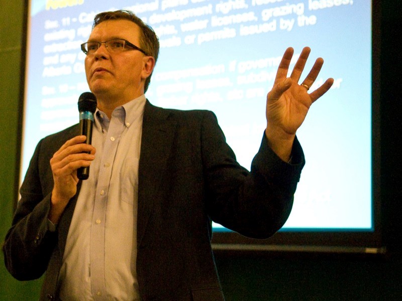 Keith Wilson presents a powerpoint presentation to over 130 Athabasca and area residents.