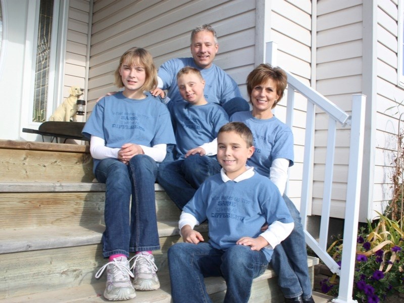 Blue Genes founder Darlene Bertin and her family will celebrate Down Syndrome Awareness Week Oct. 31 &#8211; Nov. 7. (clockwise from top) Gord, Darlene, Reagan, Taylor and